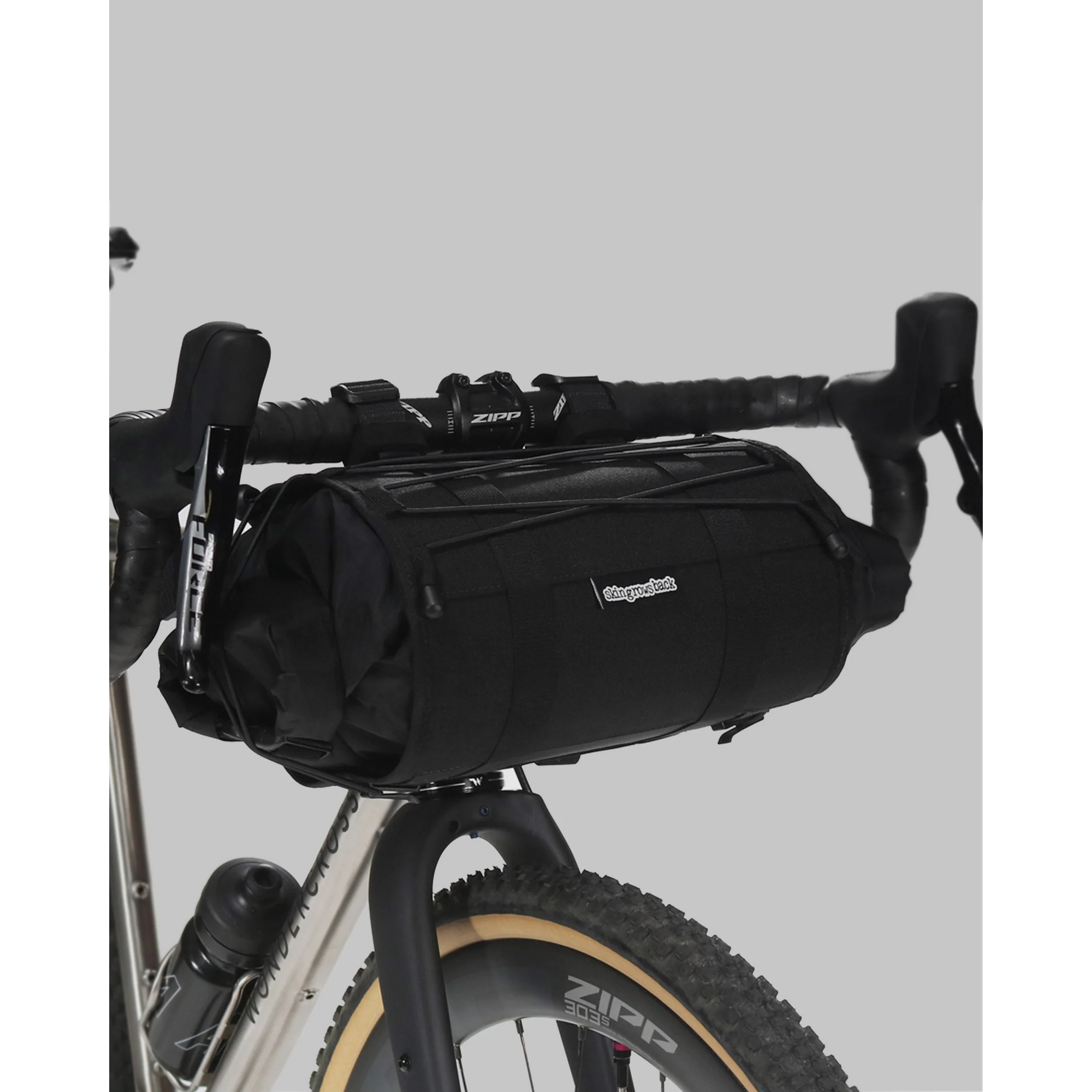 SKIN GROWS BACK Overnighter Handlebar Bag 11L